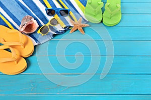 Summer beach background flip flops sunglasses sunbathing copy space