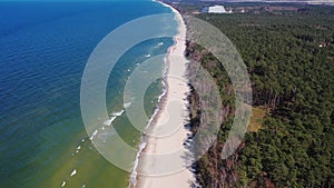 A summer beach on the coast of Poland, the Baltic Sea, aerial view.