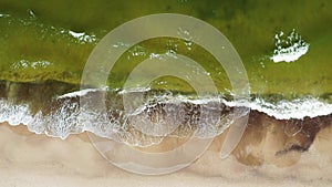 A summer beach on the coast of Poland, the Baltic Sea, aerial view.