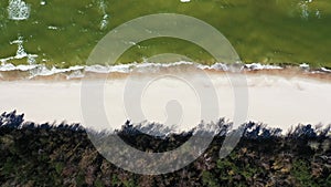 A summer beach on the coast of Poland, the Baltic Sea, aerial view