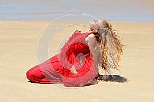 Summer beach girl in red dress