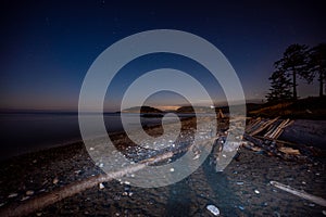 Summer Beach illuminated at night at Deception Pass