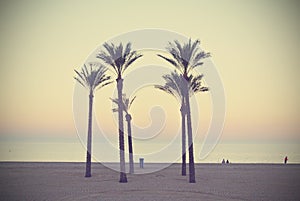 Summer beach landscape with palms, sunset, retro/vintage