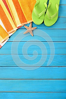 Summer beach objects vertical border, flip flops, copy space