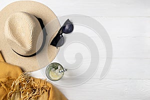 Summer beach pool composition with hat sunglasses refershing drink photo