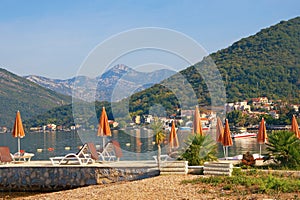 Summer beach vacation. Beautiful sunny Mediterranean landscape. Montenegro, Adriatic Sea, Bay of Kotor