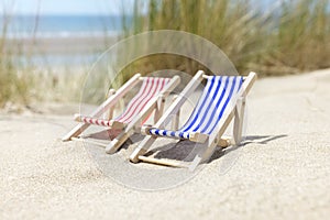 Summer beach vacation, two deck chairs