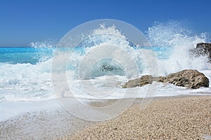 Summer on a beach, windy day, big waves