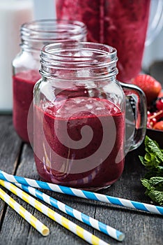 Summer berries smoothie in mason jar
