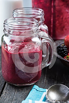 Summer berries smoothie in mason jar
