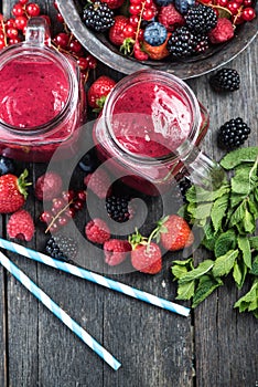 Summer berries smoothie in mason jar