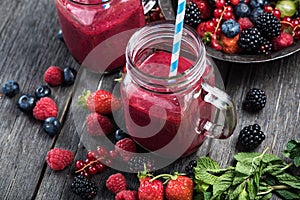 Summer berries smoothie in mason jar
