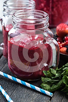 Summer berries smoothie in mason jar