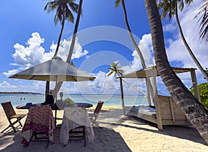 The summer with a blue sky background under umbrella as white sand beach summer tropical