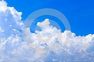 Summer blue sky background and white clouds in sunny day with c