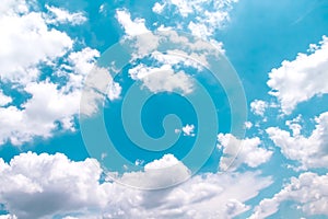Summer blue sky with clouds patterns close up on background