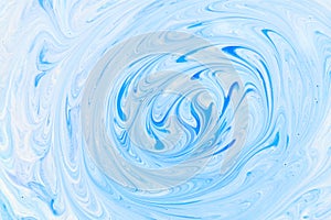 Summer blue and white ink mixing abstract or natural watercolor paint background, fluid art