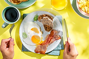 Summer breakfast - eggs, bacon, pancakes, cereal