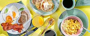 Summer breakfast - eggs, bacon, pancakes, cereal