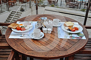 Summer breakfast for two in a cafe