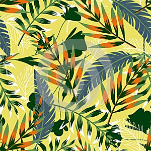 Summer bright original seamless pattern with tropical leaves and plants on a light yellow background. Vector design. Jung print. F