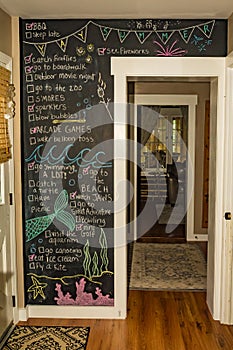 Summer Bucket List on chalkboard wall