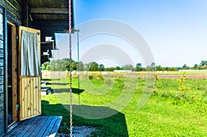 Summer cabin by a countryside farm