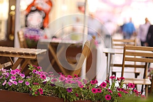 Summer cade exterior with flower box and table