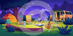 Summer camp at night time. Rv caravan at campfire photo