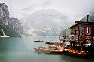 Summer cloudy day at Lago di Braies, Italy. Rainy weather.