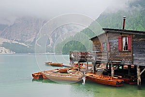 Summer cloudy day at Lago di Braies. Rainy weather.