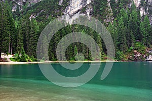 Summer cloudy day at Lago di Braies. Rainy weather.