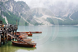 Summer cloudy day at Lago di Braies. Rainy weather.