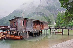 Summer cloudy day at Lago di Braies. Rainy weather.