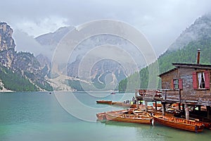 Summer cloudy day at Lago di Braies. Rainy weather.