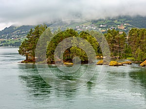 Summer cloudy fjord landscape, Norway