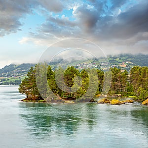 Summer cloudy fjord landscape, Norway