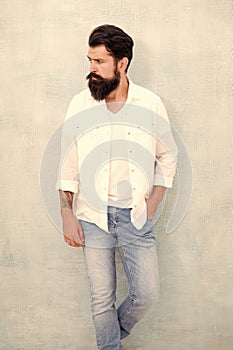 Summer collection. Menswear concept. Fashion clothes. Attractive guy wall background. Summer fashion. Bearded model photo