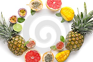 Summer composition with tropical fruits on white background