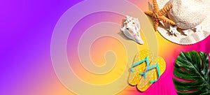 Summer concept with a straw hat, starfish, beach sandals and shell Yellow light bulb pattern with shadow