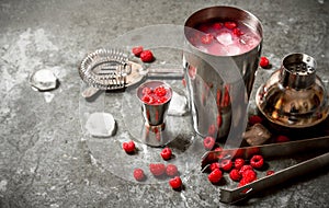 Summer cooling cocktail of wild raspberries with ice.