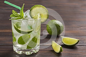 Summer cooling drink with ice, lime and mint. Non-alcoholic beverage