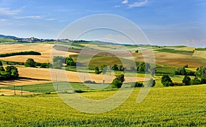 Summer country landscape in Monferrato, Piemonte, near Moncalvo, fields, hills and clouds