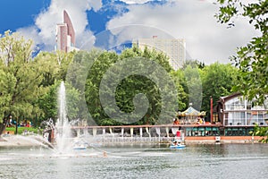 Summer day in city center park pond