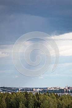 Summer day raining viewed from far