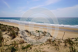 Summer day on sandy beach in Lacanau France