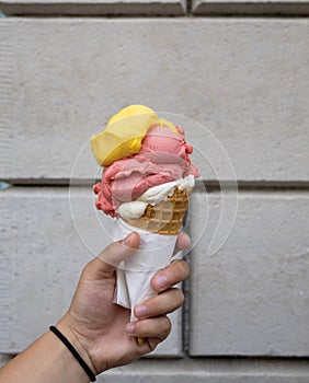 Summer day sweet treat of gelato in a waffle cone