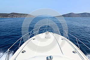 Summer day traveling by the yacht near Spetsopoula and Spetses islands, Saronic Gulf, Greece.