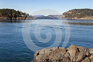 A summer day view of the waters of Deception Pass in Washington.