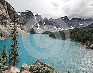 Summer days over Moraine Lake`s blue water in Banff